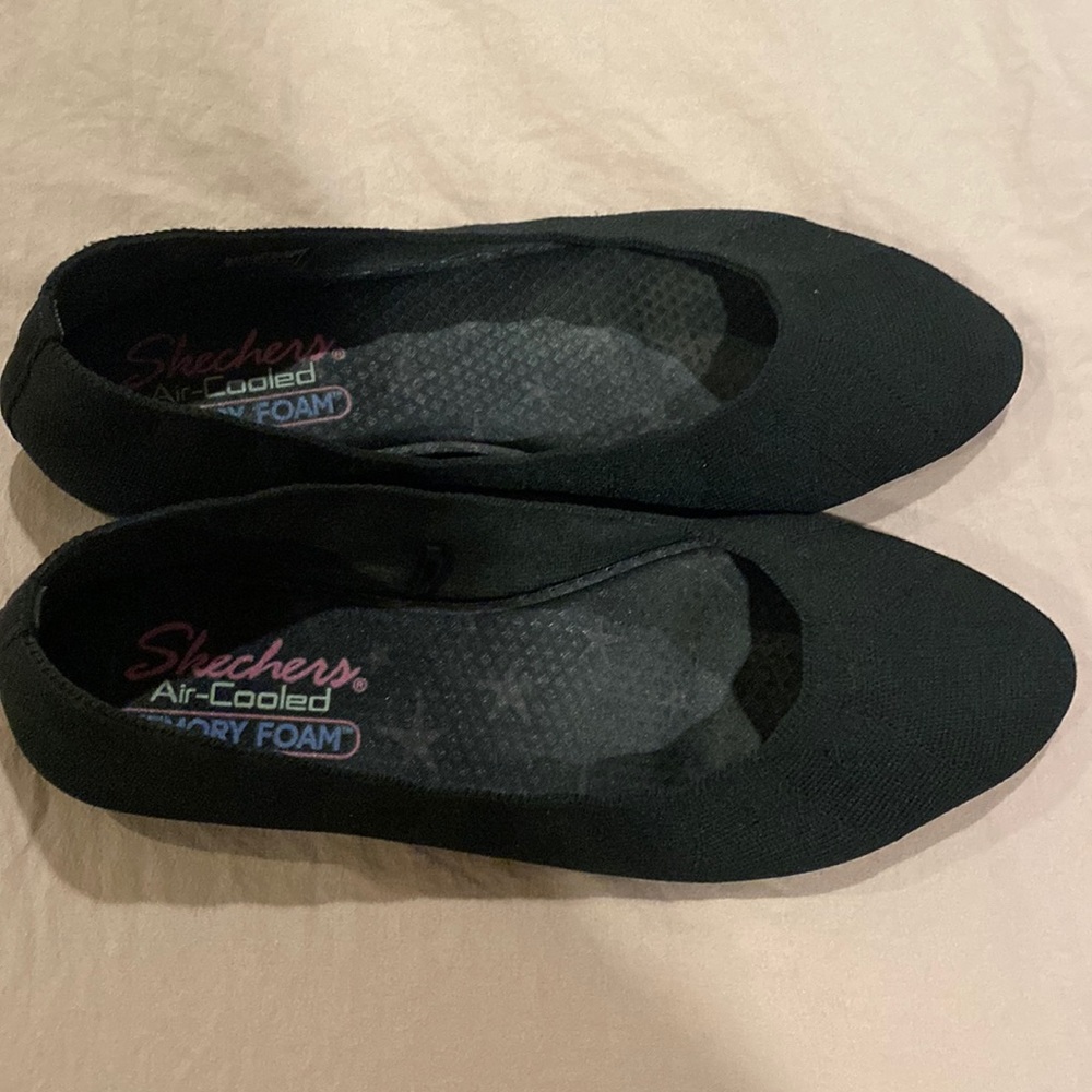 Sketchers black slip on